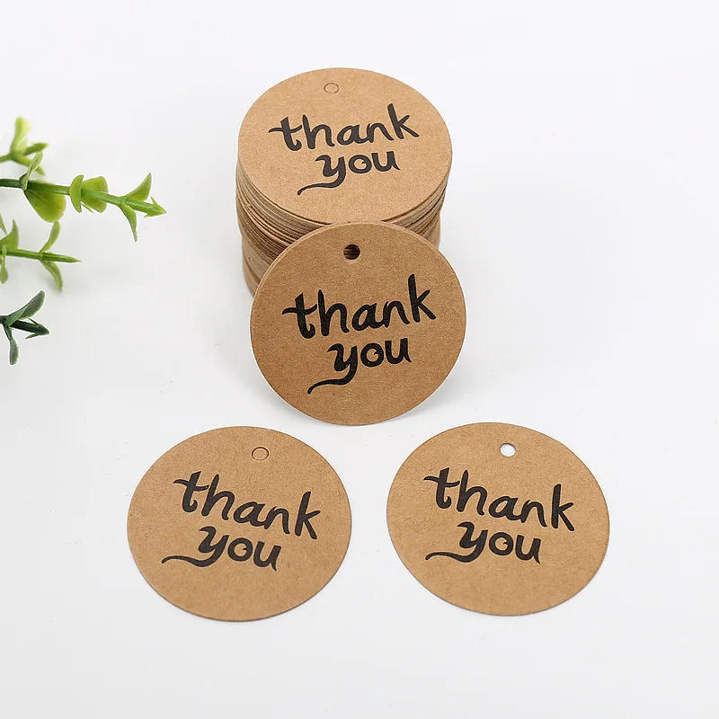 Description Picture 3 of item100pcs 4cm Round Kraft Paper Tags Thank You Merci Love Print Tag Labels Handmade Product Garment Shoes Hang Tag DIY Accessories
