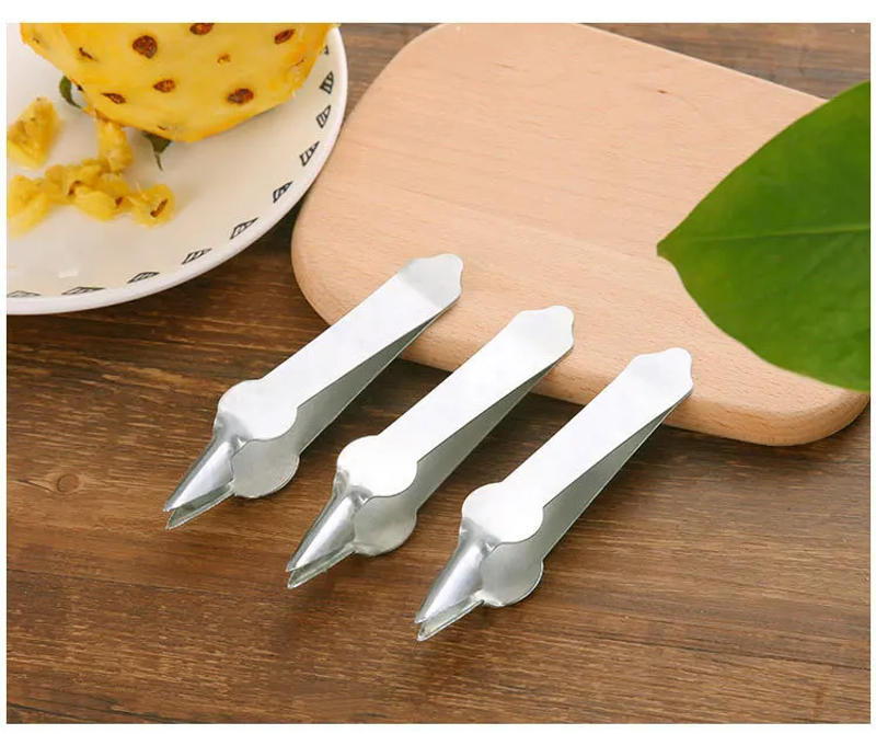 Description Picture 2 of itemStainless Steel Strawberry Huller Fruit Peeler Pineapple Corer Slicer Cutter Kitchen Knife Gadgets Pineapple Slicer Clips New