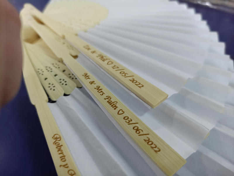 Description Picture 6 of item30/50Personalized wedding fan white folding elegant paper hand fan wedding party gift bride Customized hand fan gift decoration