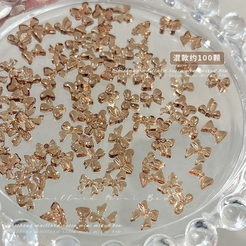 Description Picture 6 of item100PCS Glossy Ice Translcuent Coffee Maillard Bow Ribbon Resin Nail Art Rhinestones Decorations Manicure Ornaments Accessories