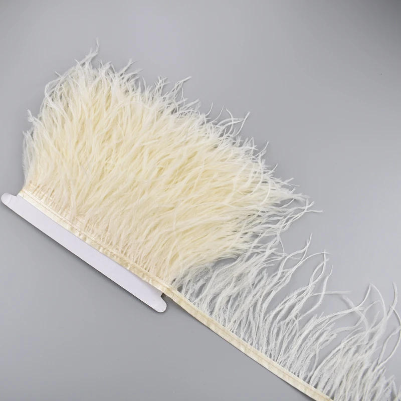 Description Picture 6 of item1Meters Ostrich Feathers on Tape Fringe Trim Ribbon 10-15cm 4-6" Long White Feather Trims Decor for Clothes Flecos Decoration