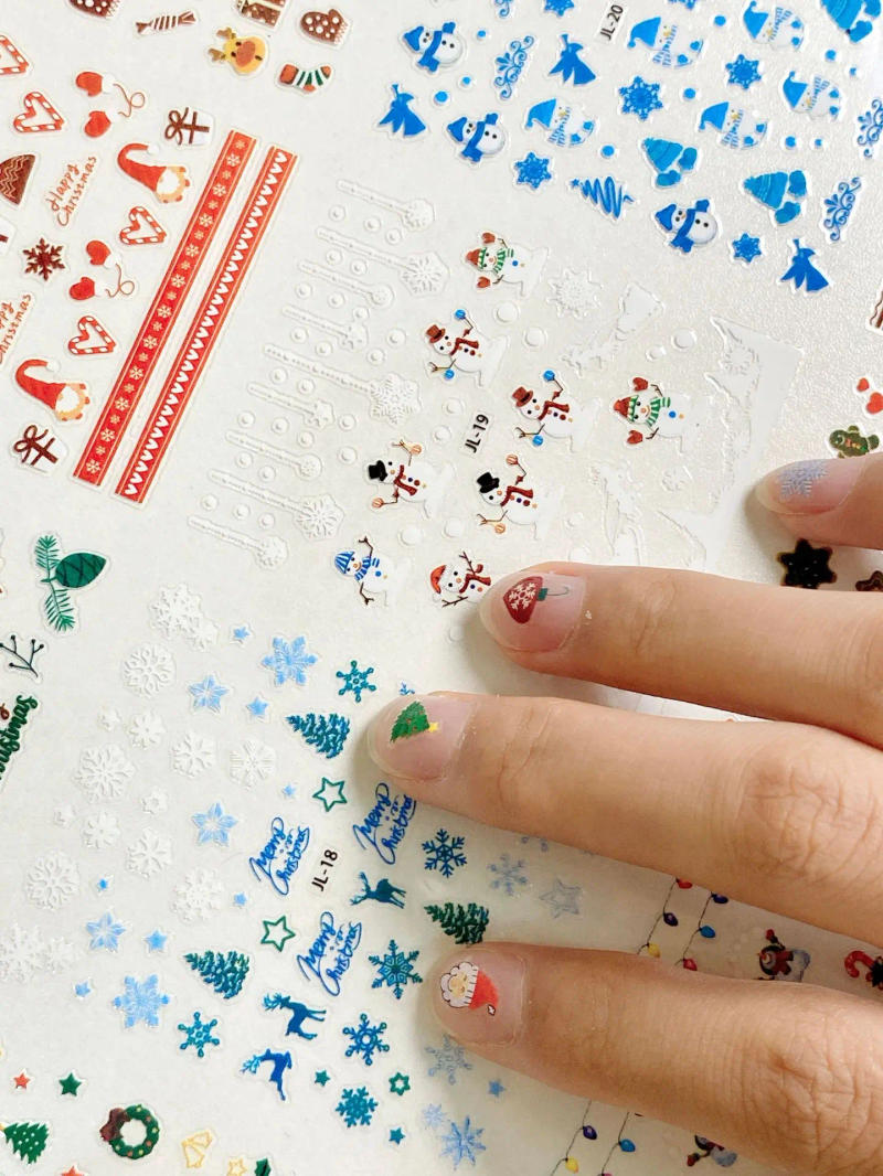 Description Picture 4 of item30Sheets Christmas Nail Stickers 1000+ Patterns Christmas Nail Art Decals Adhesive Nail Decals with Deer Snowman (Classic Style)