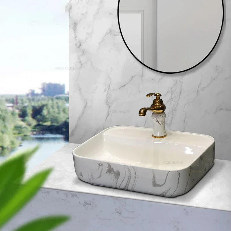 Description Picture 6 of itemNordic Ceramic Bathroom Sinks Oval Above Counter Basin Light Luxury Marbling Washbasin Designer Balcony Home Vanity Single Basin