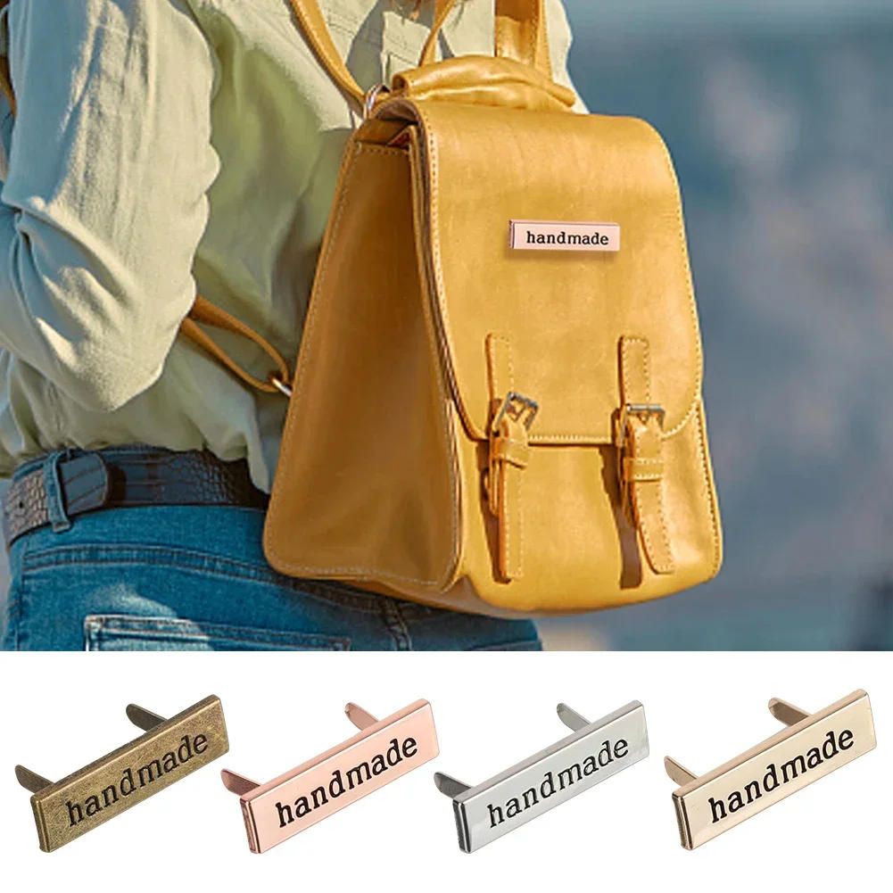 Description Picture 3 of item10Pcs Rectangle Metal Labels Zinc Alloy Die-casting Engraved Handmade Labels DIY Bags Crochet Clothes Hats Garment Labels Tags