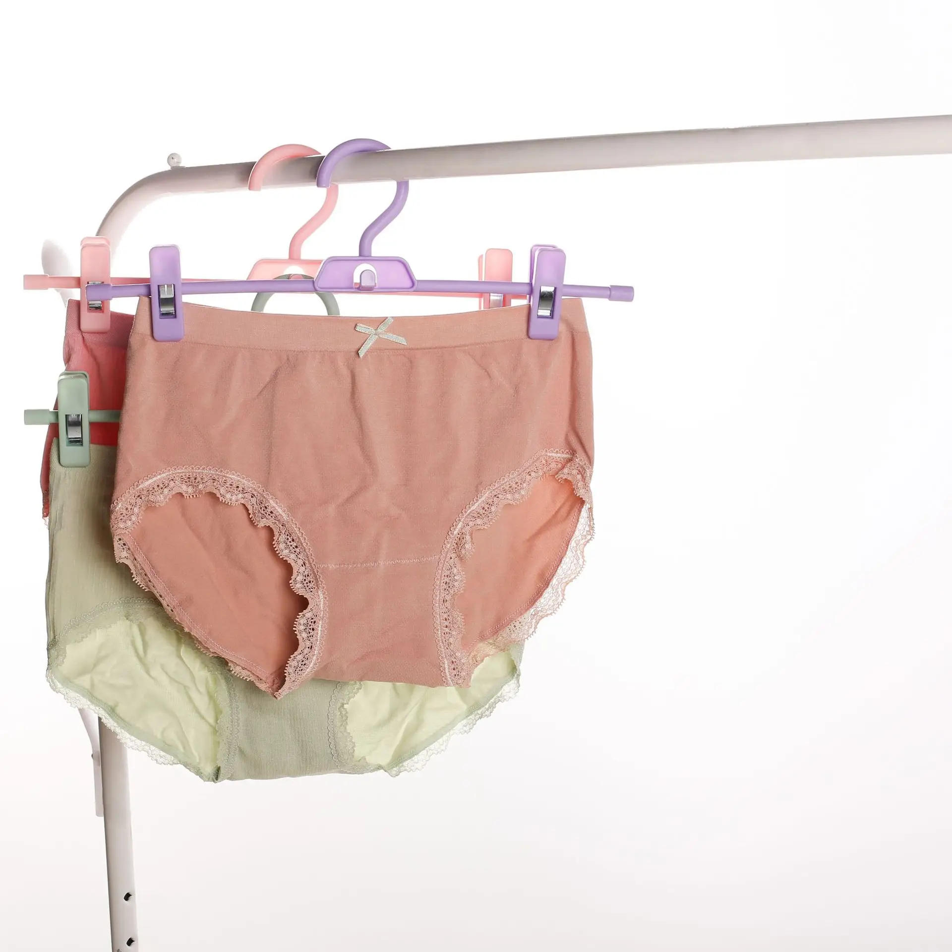 Description Picture 5 of itemSkirt Peg Hanger with Adjustment Plastic Grip Pant Rack Space Saving Attachable Underwear Drying Rack Wardrobe Storage Organizer