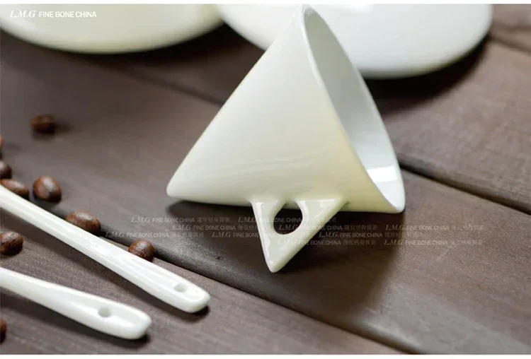 Description Picture 5 of itemNew special-shaped pure white pointed cup and saucer ceramic bone China cup couple creative coffee cup and saucer set