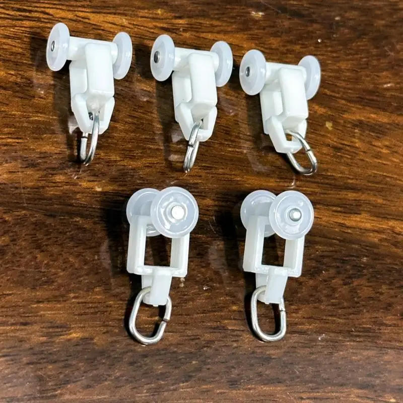 Description Picture 5 of item40PCS plastic track pulley old-fashioned universal curtain bead hanging wheel hook window decoration hardware accessories