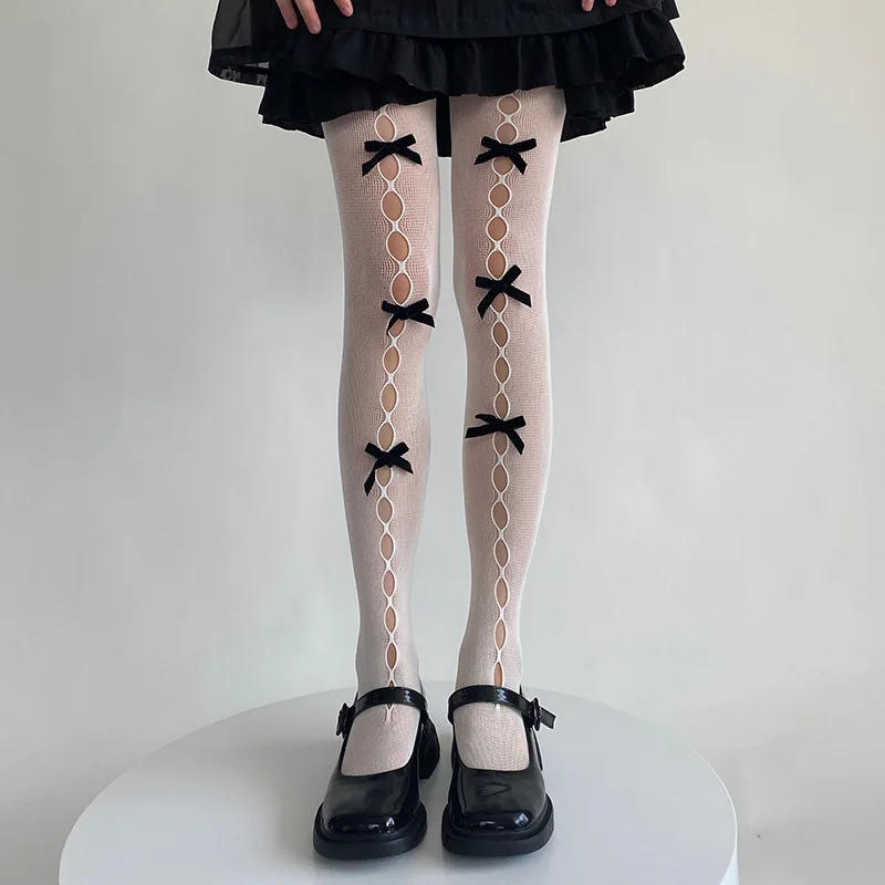 Description Picture 2 of itemSweet Cute Women Hollow Out Bowknot Tights Pantyhose Japanese Style Kawaii Thigh High Socks Pantyhose Fishnet Stockings