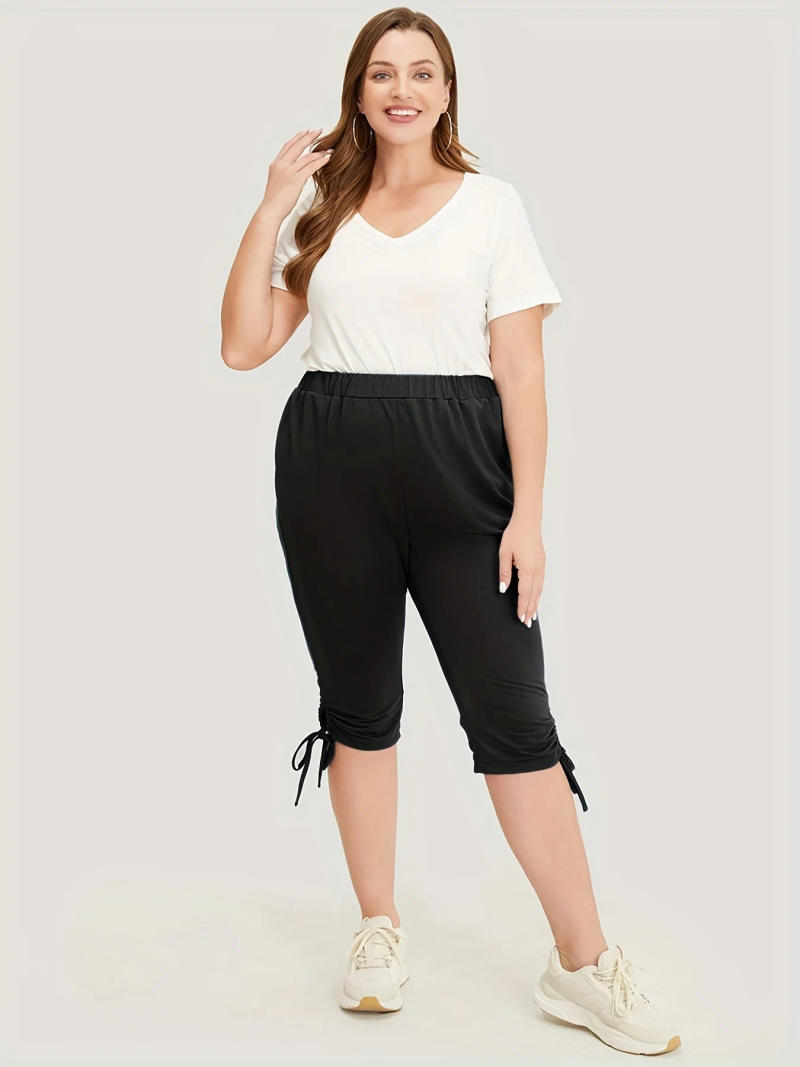 Description Picture 3 of item2023 Summer women plus size High street style pant leg lace-up fashion design solid color medium trousers capri pants