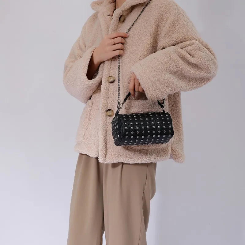 Description Picture 6 of itemEdgy Elegance Neutral Punk Style Round Diagonal Rivet Retro Barrel Bag