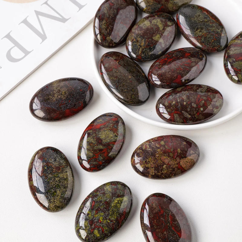 Description Picture 4 of item1PC Natural Dragon Blood Stone Hot Compress Stone - Healing Crystal Energy Fingertip Toy for Home Craft Decoration and Gifts