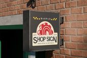 Outdoor Retail Hanging Shop Signage Mockup Right Side View