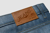 Embossed Leather Patch Jeans Mockup For Apparel Preview 2
