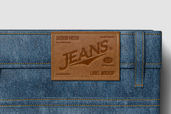 Embossed Leather Patch Jeans Mockup For Apparel Preview 3