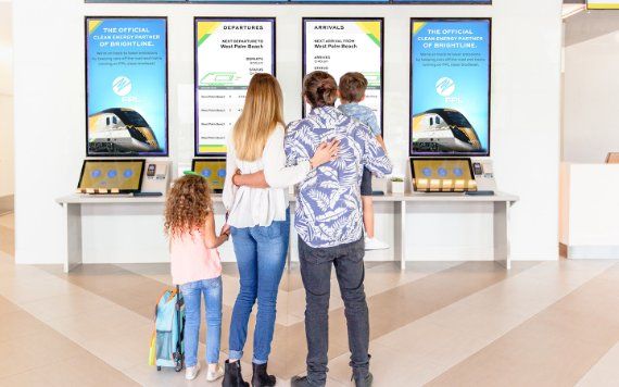 Family at the Brightline station