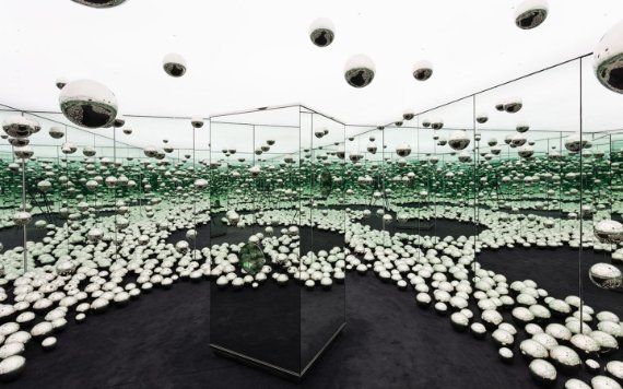 Yayoi Kusama's Let's Survive Forever Infinity Room with silver spheres