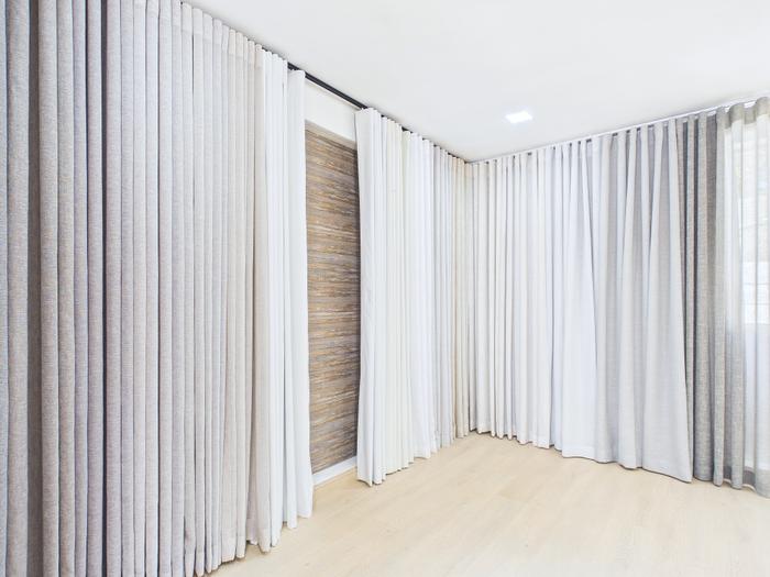 Close detail of a wave-heading curtain