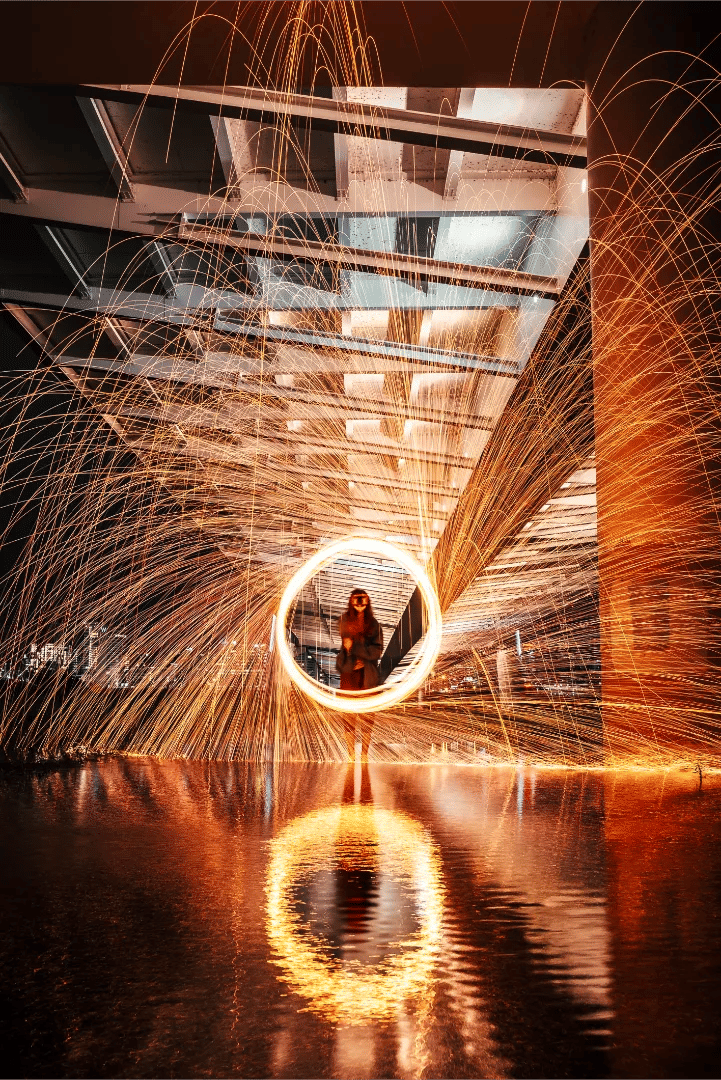 Steel wool light painting under a Dallas highway overpass.