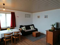 Stube mit Essecke mit Bettsofa