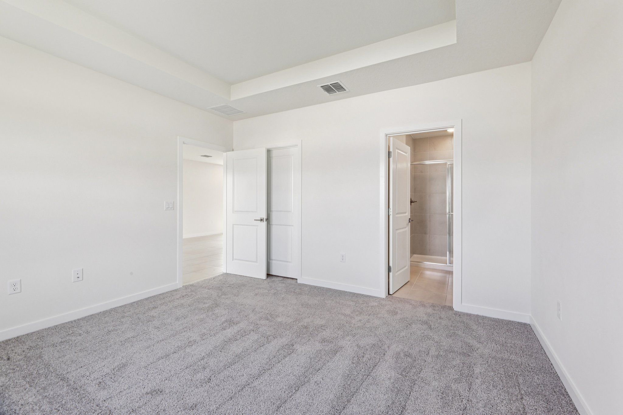 Vacant bedroom in a Winter Haven new construction home photographed by Magic Lens Photo Media