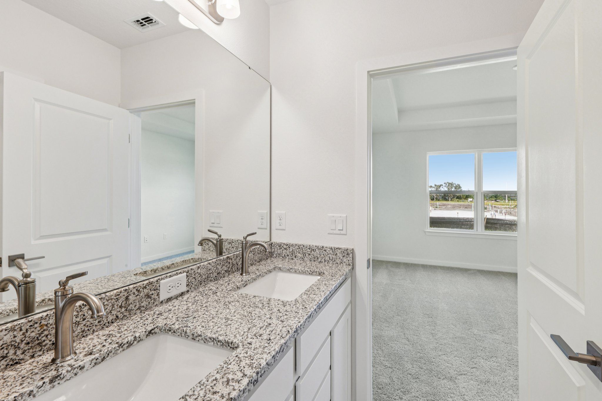 Bathroom in a Winter Haven new construction home photographed by Magic Lens Photo Media