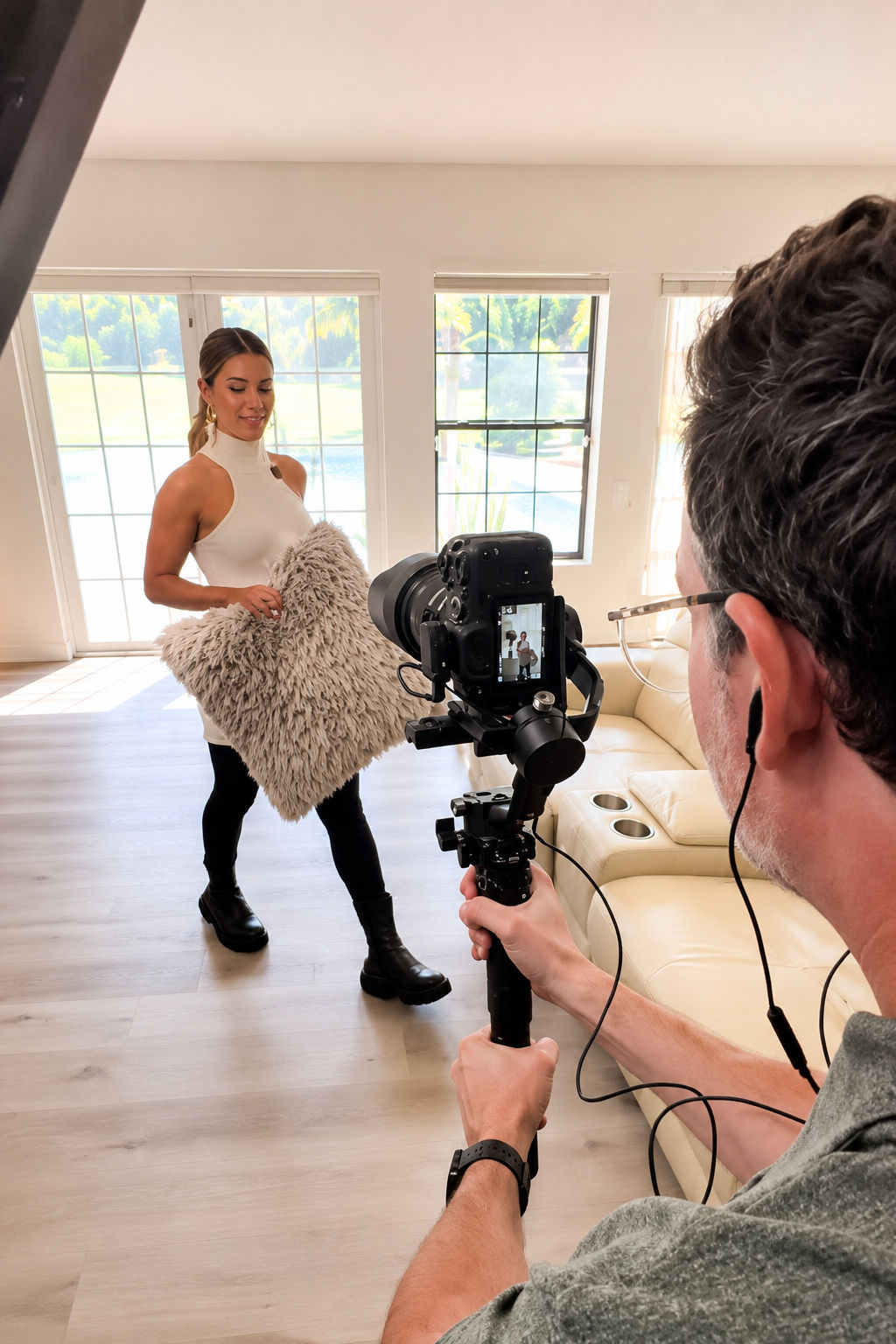 Gustavo Sousa filming a Realtor inside a real estate listing for professional social media content