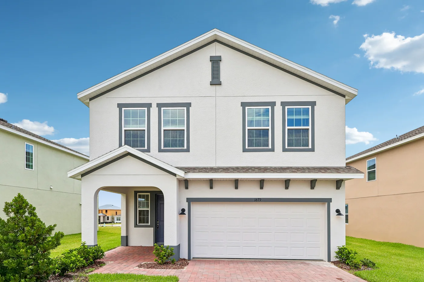 New construction model home exterior photographed for builder marketing in Central Florida