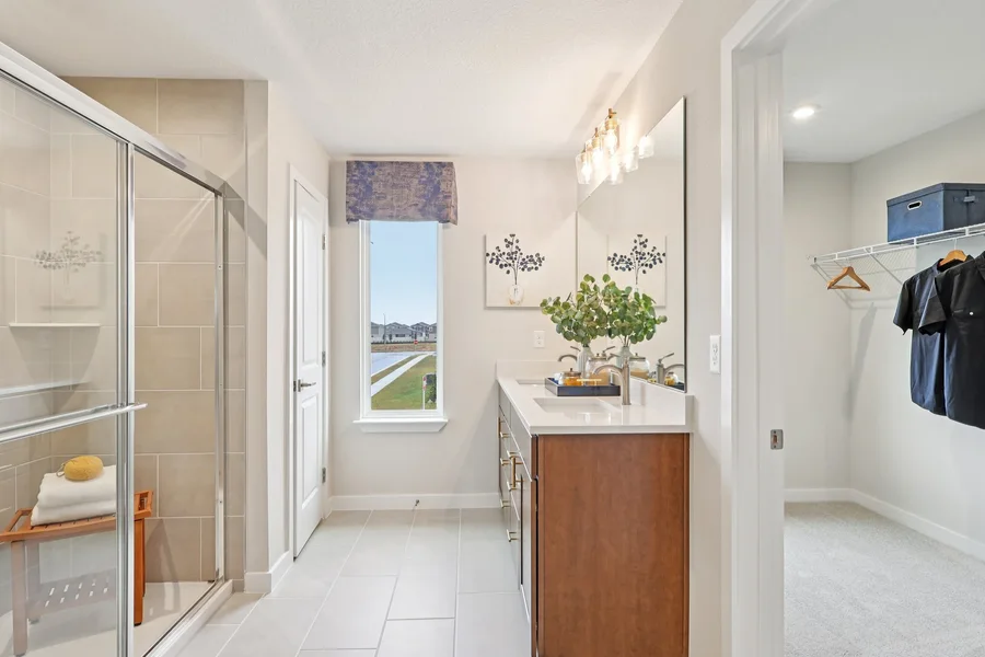 Walk-in closet photographed to show storage space in a vacation home.
