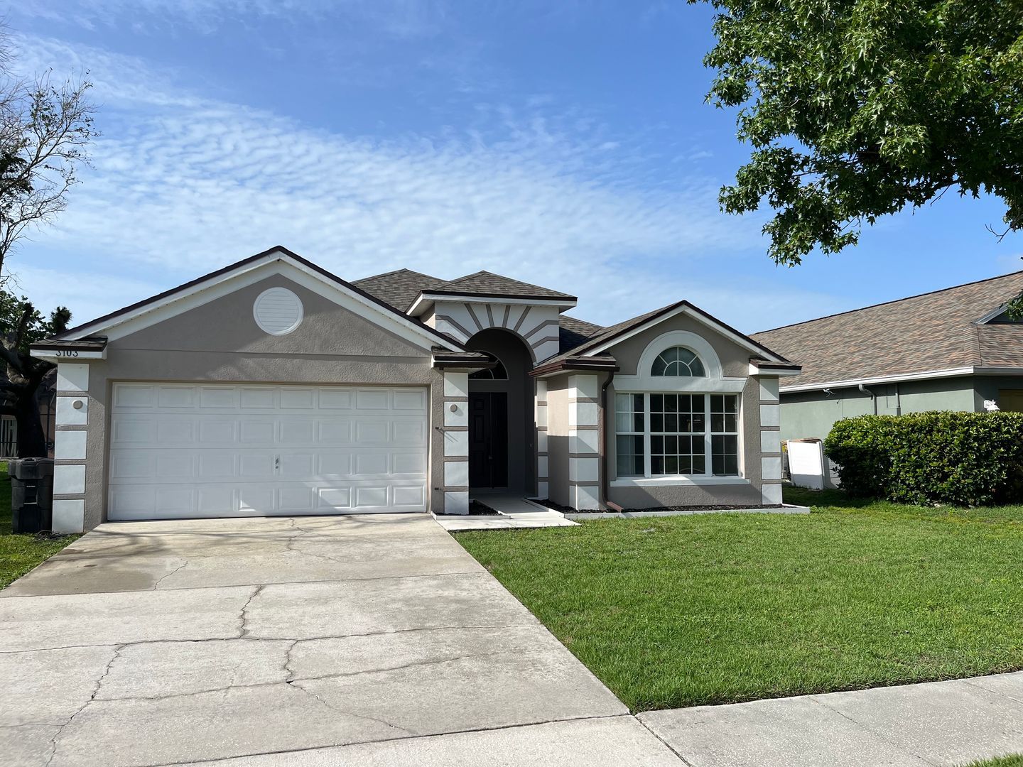 Residential property with manicured lawn