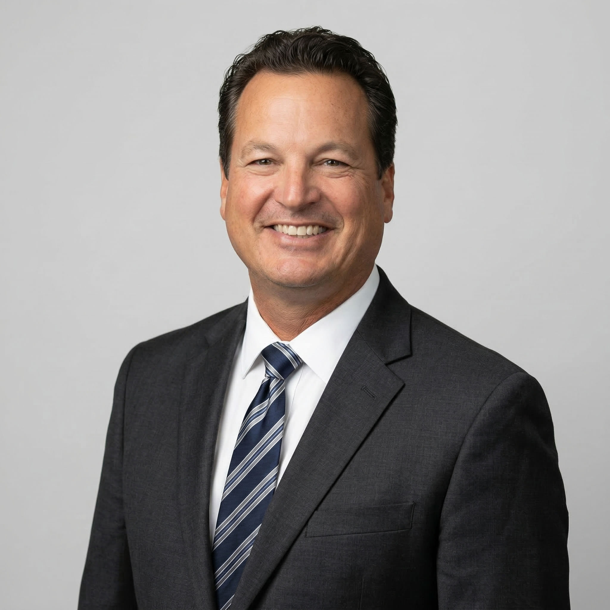 Guy Bouchard — CEO & President