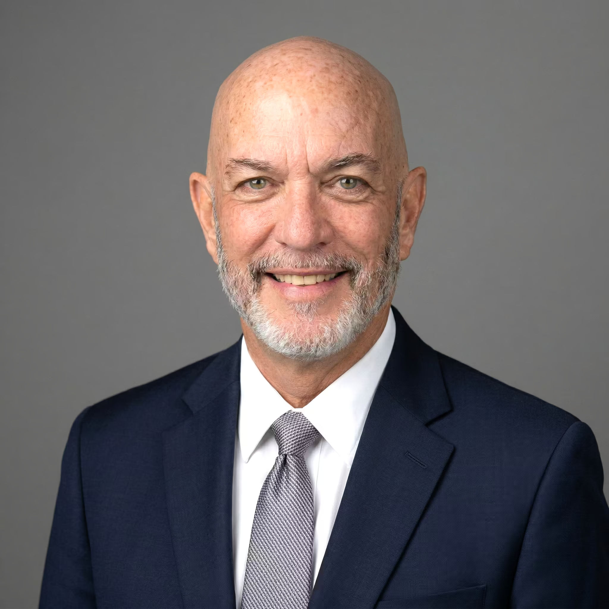 Guy Bouchard — CEO & President