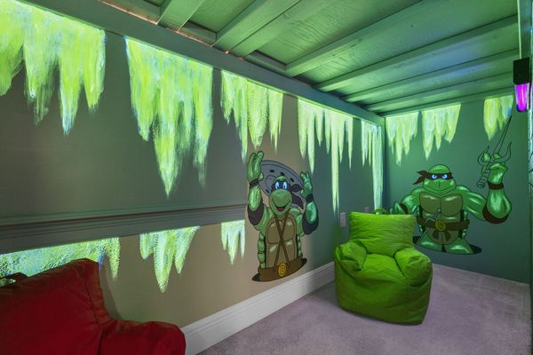 The kids can play in this underground play area featuring a Smart TV