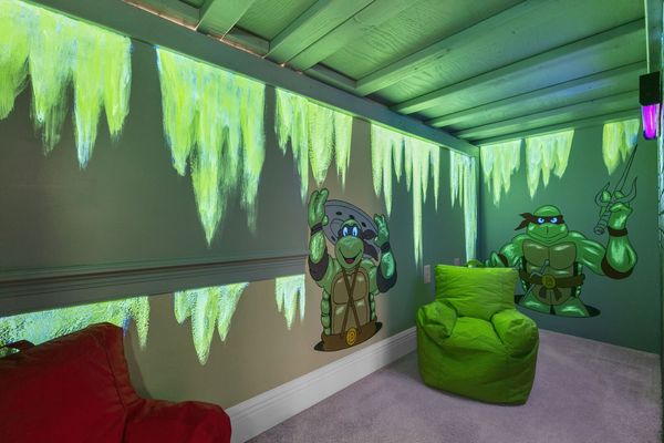 The kids can play in this underground play area featuring a Smart TV