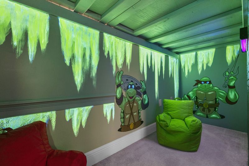 The kids can play in this underground play area featuring a Smart TV