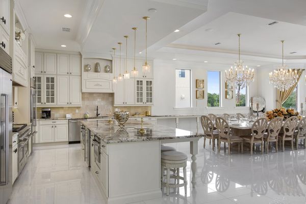 The kitchen has custom cabinentry and top of the line appliances