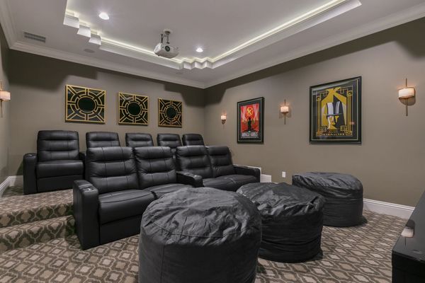 Host a movie night with leather recliners to seat 9