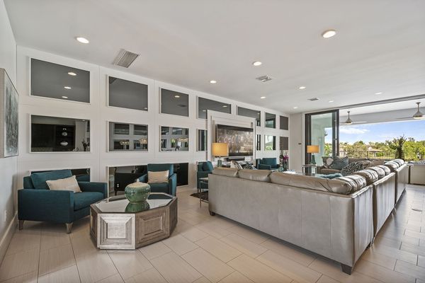 Open living area with access to the pool deck