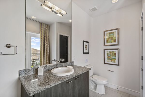 A half bathroom located on the third floor