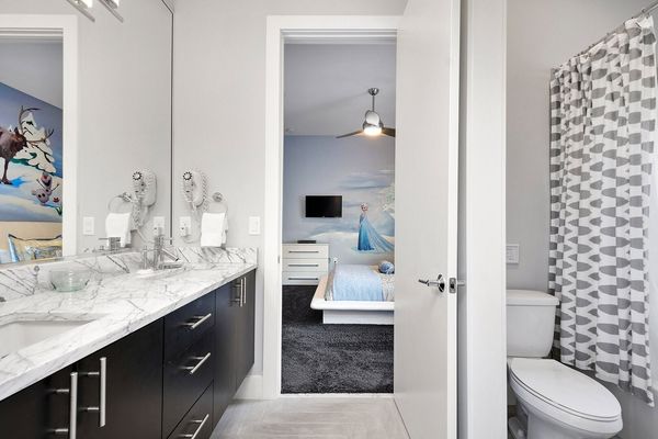 Bedroom 4 and 5 will share a full bathroom with marble dual vanity and shower/tub combo