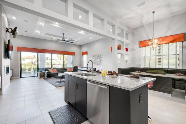 The kitchen offers a view of the living and dining area
