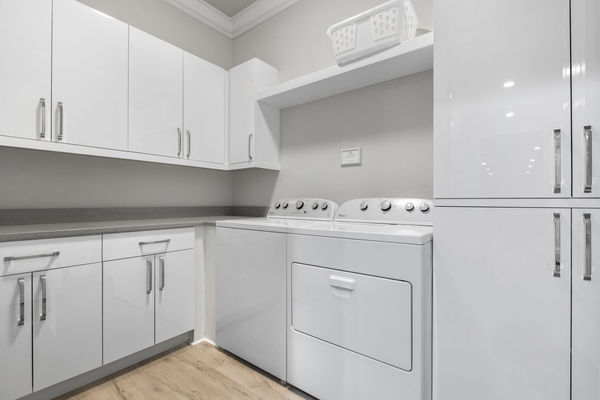 The second floor laundry room makes laundry a breeze during your vacation