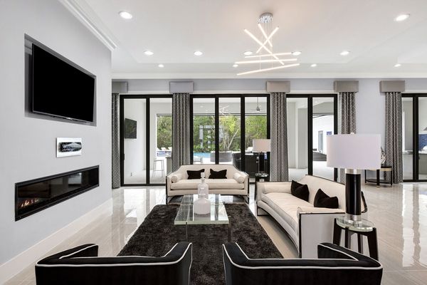 In this first living room area sit back and watch a movie (Fireplace not allowed for guest use)