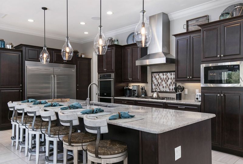 Spacious kitchen area with a breakfast bar