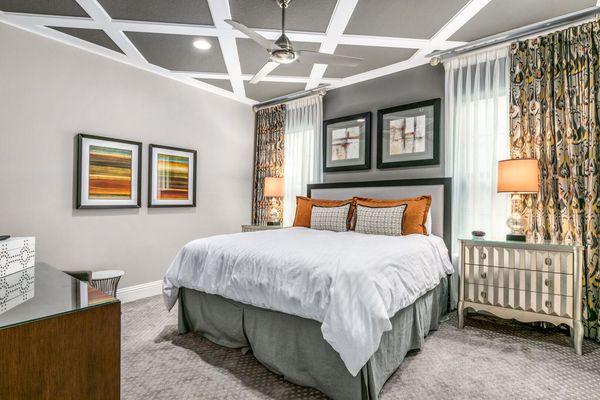 The master suite with a king size bed and en-suite bathroom