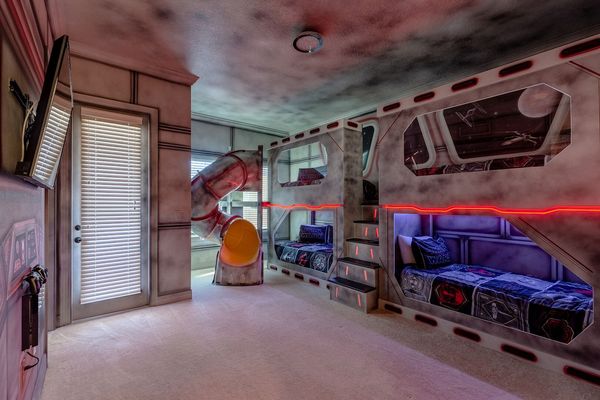 There's so much fun waiting in this galaxy-inspired bedroom