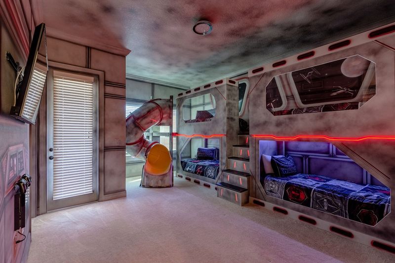 There's so much fun waiting in this galaxy-inspired bedroom