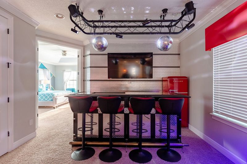 Enjoy a drink or snack at the wet bar and watch your favorite shows or movie on the