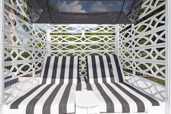 Lay back in the comfort of these loungers with shade