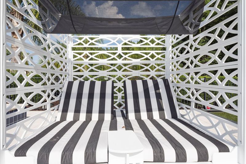 Lay back in the comfort of these loungers with shade