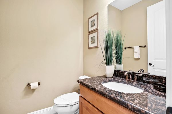 The half bathroom is located on the first floor